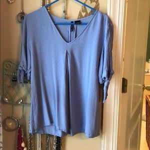 Light blue blouse. Size L, $6